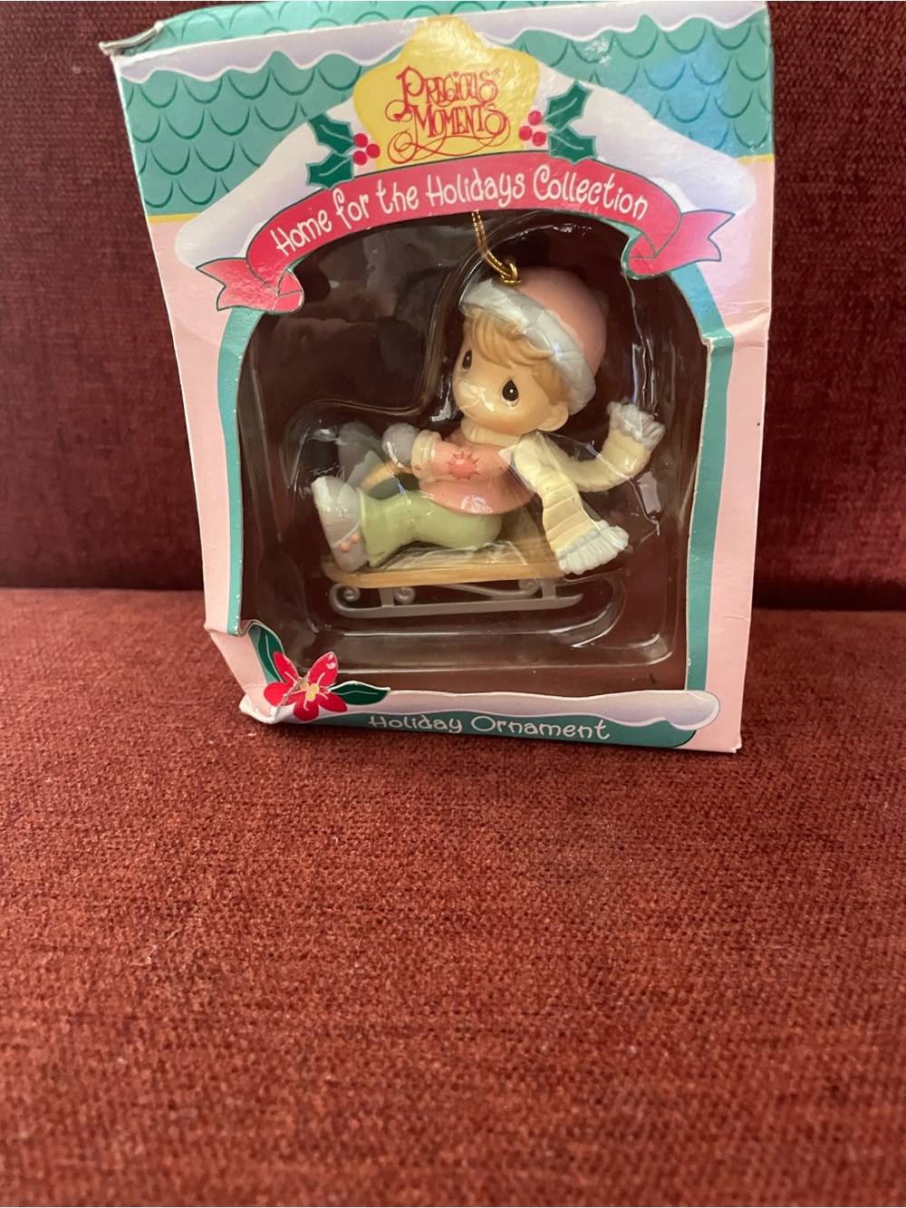 Precious Moments Child on Sled Ornament in Pink and Cream